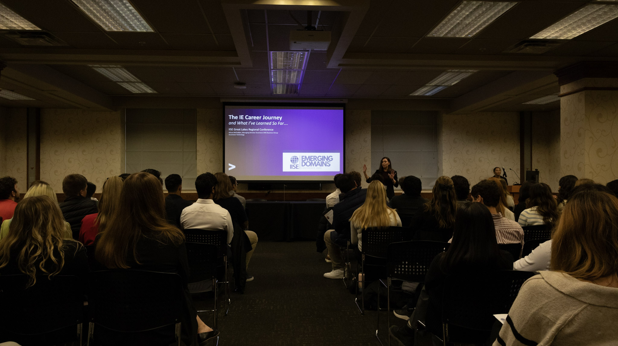 IE Alumna Allison McFadden delivers an address to attendees.